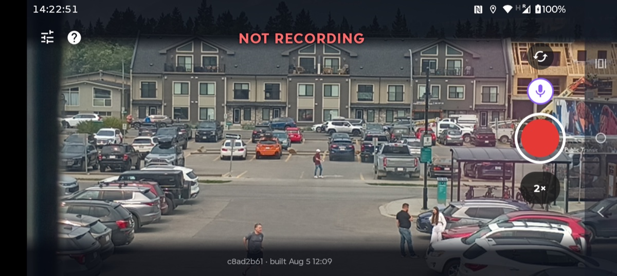 Race Recorder aim screen: a live camera view of a parking lot, NOT RECORDING across the top, and the capture controls down the right-hand edge